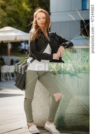 Fashion model outdoor in modern city 47144865