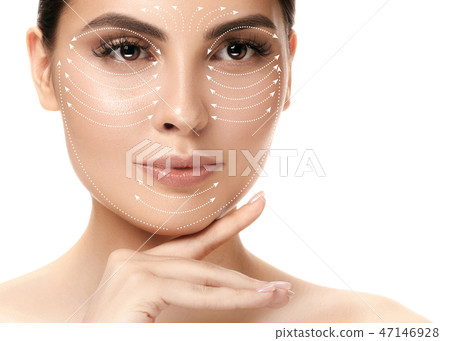 Close-up portrait of young, beautiful and healthy woman with arrows on her face 47146928