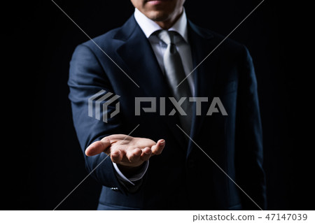Businessmen who give out hands 47147039