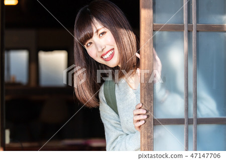 Old private house and a young lady 47147706