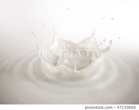 Milk double crown splash in milk pool with ripples 47150688