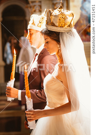newlyweds wedding ceremony in the church 47151451