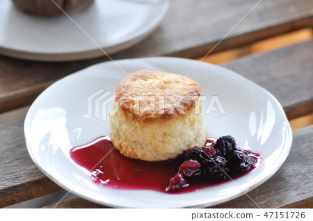scone with mulberry sauce scone with mulberry sauce 47151726