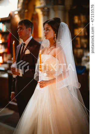 newlyweds wedding ceremony in the church, newlyweds wedding ceremony in the church, 47153576