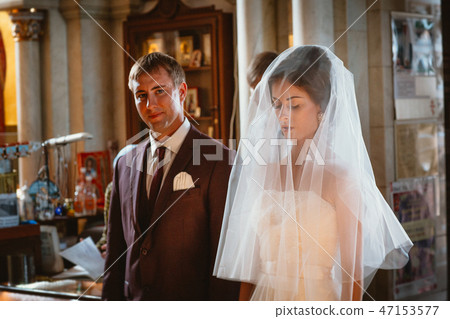 newlyweds wedding ceremony in the church newlyweds wedding ceremony in the church 47153577