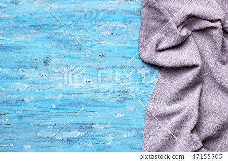 Gray tablecloth on blue 47155505