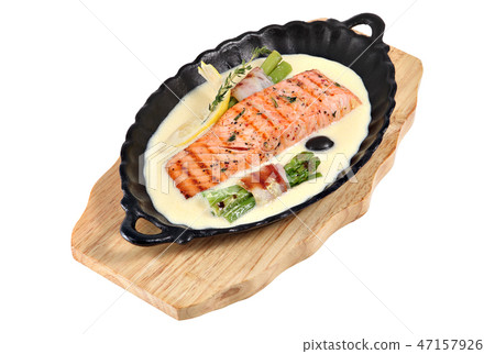 Fried salmon with green asparagus in bacon. 47157926