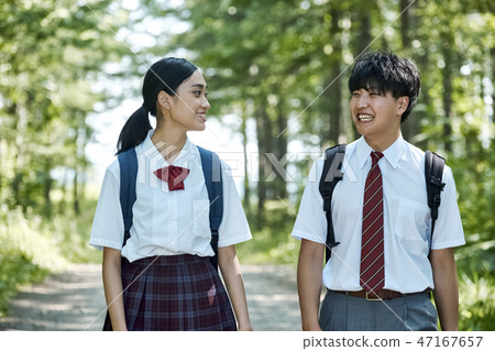 High school student couple going to school 47167657