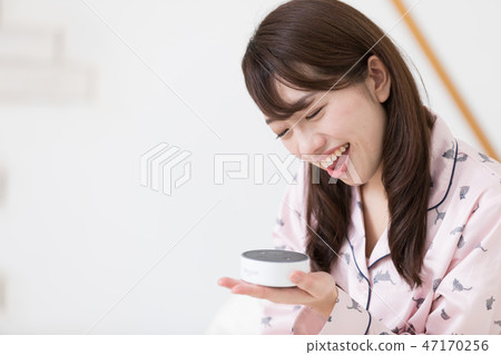 A woman on the bed 47170256