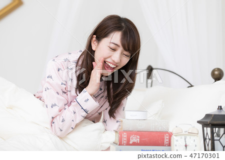 A woman on the bed 47170301