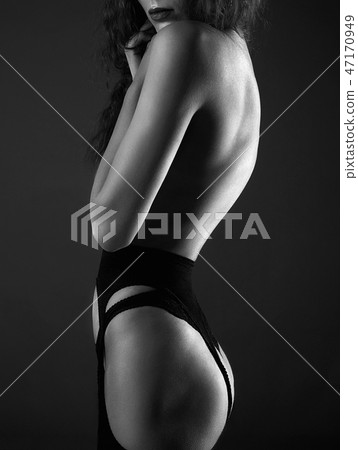 Back of Woman in underwear. Black Sexual lingerie Back of Woman in underwear. Black Sexual lingerie 47170949