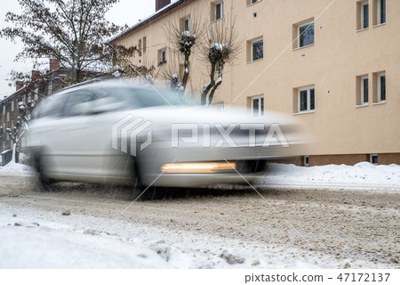 Snow calamity on the road. Car driving at winter Snow calamity on the road. Car driving at winter 47172137