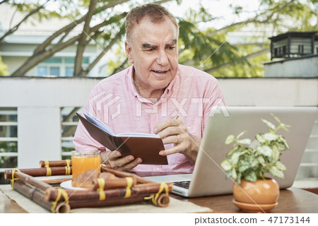 Aged man watching lection Aged man watching lection 47173144