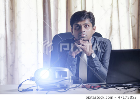 Businessman watching presentation Businessman watching presentation 47175852