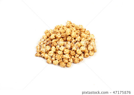 Pile of caramel popcorn on white background. Pile of caramel popcorn on white background. 47175876