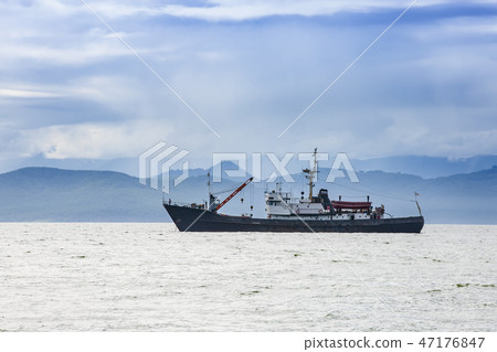large fishing vessel on the background of hills large fishing vessel on the background of hills 47176847