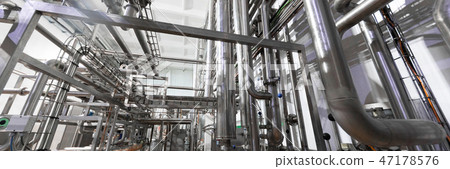 Metallic pipes isolated on factory background 47178576