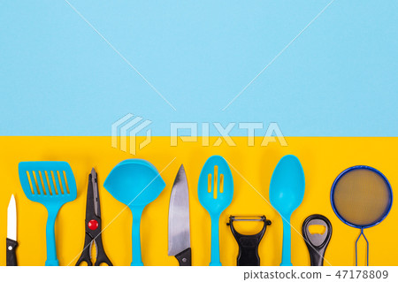 Design concept of kitchen utensils isolated with copyspace on blue-yellow background 47178809