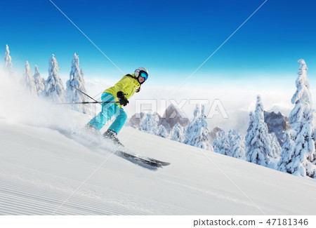 Young woman skiing in Alps 47181346