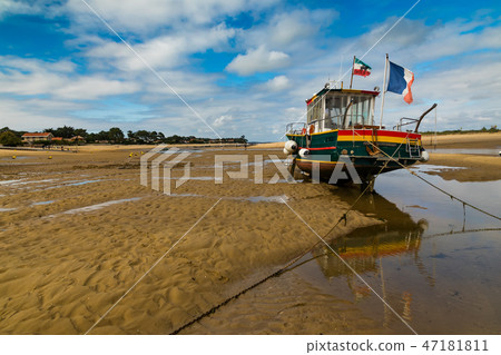 Arcachon Bay - France - fishing boats on water near the Cap Ferret Arcachon Bay - France - fishing boats on water near the Cap Ferret 47181811