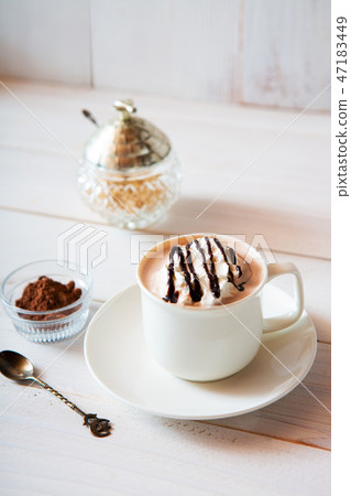 Hot cocoa with whipped cream 47183449
