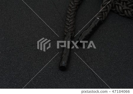 Close up of black rope on the black floor 47184066