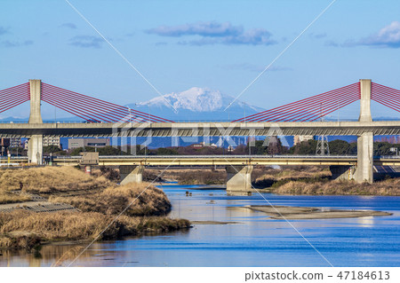 Nagoya High Speed Red Tonbo Bridge and Mt. Ontake over the Shonai River, Aichi Prefecture 47184613