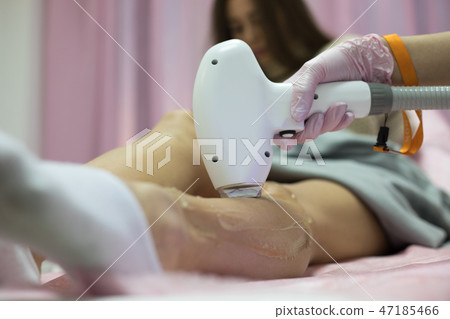 Laser epilation and cosmetology. Laser hair removal cosmetology procedure. 47185466