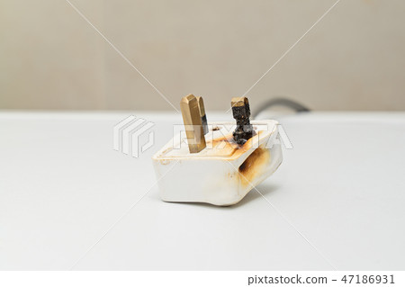 Burned 250V uk style socket Burned 250V uk style socket 47186931