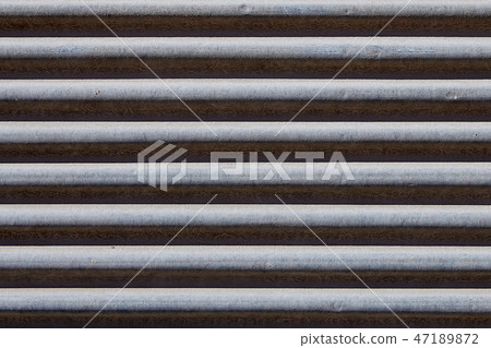 Old roller shutter, metal garage door backdrop 47189872