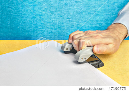 Hand pushes the punch hard, mockup with copy space Hand pushes the punch hard, mockup with copy space 47190775