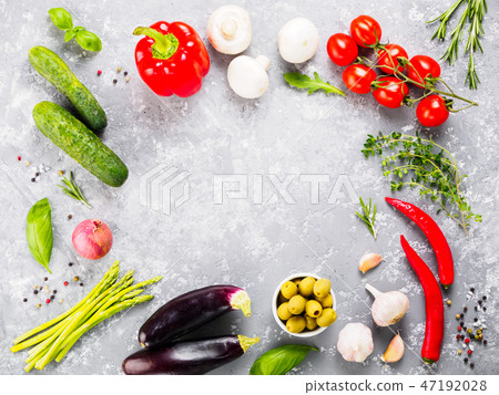 Vegetables and herbs on gray concrete background with copyspace in center 47192028