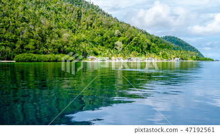 Village on Monsuar Island. Raja Ampat, Indonesia, West Papua Village on Monsuar Island. Raja Ampat, Indonesia, West Papua 47192561