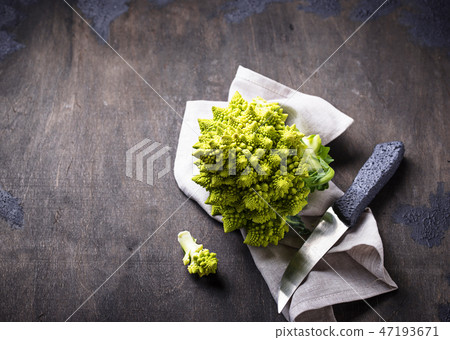Romanesco broccoli on dark background Romanesco broccoli on dark background 47193671