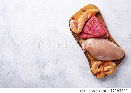 Beef and chicken meat, fish and shrimps. Beef and chicken meat, fish and shrimps. 47193831