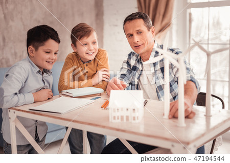 Caring family man spending weekend with his school boys 47194544