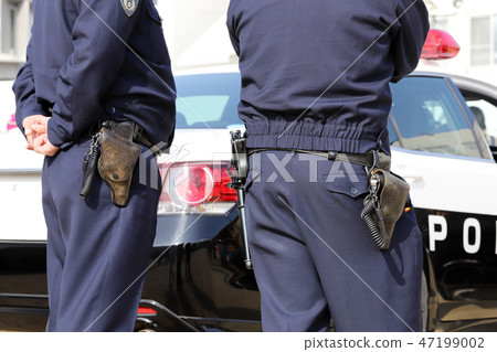 Police officer police car 47199002