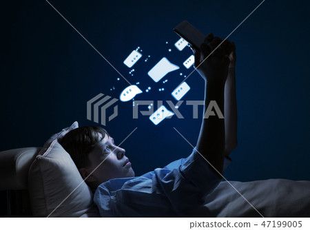 Reading in bed Reading in bed 47199005