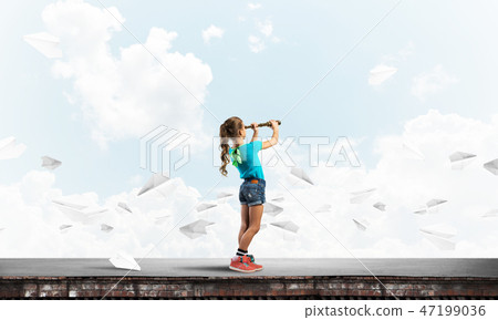 Concept of careless happy childhood with girl exploring this world Concept of careless happy childhood with girl exploring this world 47199036