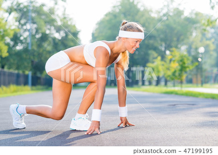 Athlete at start Athlete at start 47199195