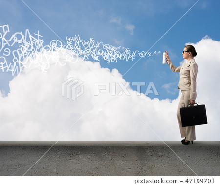 Woman using spray 47199701