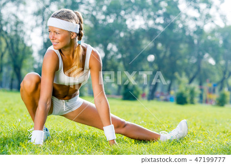 Woman in park Woman in park 47199777