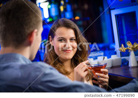 young woman in a bar young woman in a bar 47199890