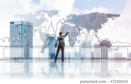 Rear view of businessman drawing social connection and networkin Rear view of businessman drawing social connection and networkin 47200020