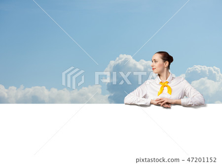 Woman presenting something 47201152