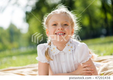Girl enjoying summertime Girl enjoying summertime 47201438