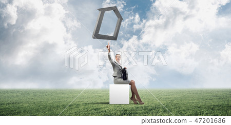 Attractive business lady or accountant outdoors on white box 47201686