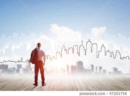Motivation and inspiration concept with modern cityscape and businessman observing it Motivation and inspiration concept with modern cityscape and businessman observing it 47201756