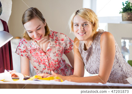 Two sempstress at work Two sempstress at work 47201873