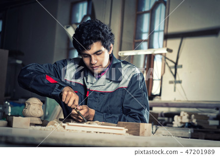 Carpenter at work 47201989